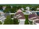 Aerial view of a house and surrounding neighborhood at 2917 Wilshire Rd, Clermont, FL 34714