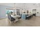 Modern kitchen with large island and stainless steel appliances at 4711 S Atlantic Ave, Ponce Inlet, FL 32127