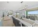 Open concept dining area with kitchen and living room access at 4711 S Atlantic Ave, Ponce Inlet, FL 32127