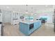 Open concept kitchen with island, stainless steel appliances, and ocean view at 4711 S Atlantic Ave, Ponce Inlet, FL 32127