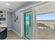 Sliding glass doors reveal stunning ocean and beach views at 4711 S Atlantic Ave, Ponce Inlet, FL 32127