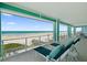 Relaxing beachfront balcony with lounge chairs and ocean views at 4711 S Atlantic Ave, Ponce Inlet, FL 32127