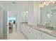 Spa-like bathroom with ocean view, double vanity, and walk-in shower at 4711 S Atlantic Ave, Ponce Inlet, FL 32127