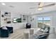 Living room boasts an ocean view, built-in shelving, and comfy seating at 4711 S Atlantic Ave, Ponce Inlet, FL 32127