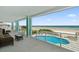 Beachfront balcony boasting ocean views, private pool, and patio furniture at 4711 S Atlantic Ave, Ponce Inlet, FL 32127