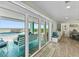 View of the ocean and pool from inside the home through sliding glass doors at 4711 S Atlantic Ave, Ponce Inlet, FL 32127