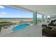Relaxing balcony overlooking the ocean, pool, and beach at 4711 S Atlantic Ave, Ponce Inlet, FL 32127