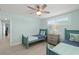 Two twin beds in a bedroom with light walls and wood-look floors at 4711 S Atlantic Ave, Ponce Inlet, FL 32127
