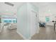Hallway with access to the living room, kitchen, and private elevator at 4711 S Atlantic Ave, Ponce Inlet, FL 32127