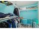 Spacious walk-in closet with built-in shelves and a desk at 4711 S Atlantic Ave, Ponce Inlet, FL 32127