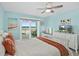 Main bedroom with ocean views and private balcony access at 4711 S Atlantic Ave, Ponce Inlet, FL 32127