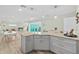 Large kitchen island with seating and plenty of counter space at 4711 S Atlantic Ave, Ponce Inlet, FL 32127