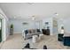 Bright living room with ocean view and comfortable seating arrangement at 4711 S Atlantic Ave, Ponce Inlet, FL 32127