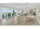 Open floor plan with ocean views, wet bar, and dining area at 4711 S Atlantic Ave, Ponce Inlet, FL 32127