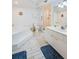 Spacious bathroom with a large garden tub and separate shower at 4575 S Atlantic Ave # 6310, Port Orange, FL 32127