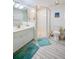 Clean bathroom with a walk-in shower and updated vanity at 4575 S Atlantic Ave # 6310, Port Orange, FL 32127