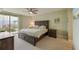 Main bedroom with king-size bed, nightstands and ocean view at 4575 S Atlantic Ave # 6310, Port Orange, FL 32127
