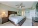 Spacious main bedroom with king-size bed, dresser and ocean view at 4575 S Atlantic Ave # 6310, Port Orange, FL 32127