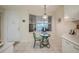 Cozy breakfast nook with small table and chairs at 4575 S Atlantic Ave # 6310, Port Orange, FL 32127
