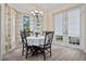 Kitchen breakfast nook with round table and four chairs at 2 King Phillips Way, Ormond Beach, FL 32174