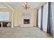 Living room with fireplace and hardwood floors at 2 King Phillips Way, Ormond Beach, FL 32174