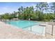 Clean and refreshing community pool with plenty of seating at 225 Sunset Point Dr, Ormond Beach, FL 32174