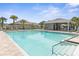 Resort-style community pool with plenty of space for swimming and sunbathing at 225 Sunset Point Dr, Ormond Beach, FL 32174