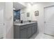 Bathroom with double vanity and large mirror at 225 Sunset Point Dr, Ormond Beach, FL 32174