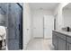 Bathroom featuring a walk-in shower with hexagon tile at 225 Sunset Point Dr, Ormond Beach, FL 32174