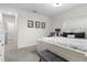 Bright bedroom with king-size bed and access to hallway at 225 Sunset Point Dr, Ormond Beach, FL 32174