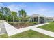 Community pool with covered patio and seating at 225 Sunset Point Dr, Ormond Beach, FL 32174