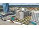 Aerial view of beachfront building, pool, and ocean at 2615 S Atlantic Ave # 7H, Daytona Beach, FL 32118