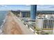 Aerial view of beachfront property with pool and parking at 2615 S Atlantic Ave # 7H, Daytona Beach, FL 32118