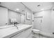 Modern bathroom with glass shower, white vanity, and updated fixtures at 2615 S Atlantic Ave # 7H, Daytona Beach, FL 32118