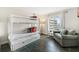 Bright bedroom featuring a bunk bed and ocean view at 2615 S Atlantic Ave # 7H, Daytona Beach, FL 32118