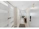Bright and airy entryway with modern doors and flooring at 2615 S Atlantic Ave # 7H, Daytona Beach, FL 32118