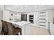 Modern kitchen with stainless steel appliances and white cabinetry at 2615 S Atlantic Ave # 7H, Daytona Beach, FL 32118