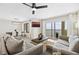 Bright living room with ocean view, comfortable seating and large TV at 2615 S Atlantic Ave # 7H, Daytona Beach, FL 32118