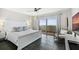 Spacious bedroom with king bed, ocean view, and private balcony at 2615 S Atlantic Ave # 7H, Daytona Beach, FL 32118