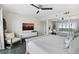 Main bedroom with king bed, ocean view, and seating area at 2615 S Atlantic Ave # 7H, Daytona Beach, FL 32118