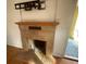 Simple fireplace with tile surround at 820 N Oleander Ave, Daytona Beach, FL 32118