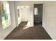 Bedroom with window, closet, and access to bathroom at 820 N Oleander Ave, Daytona Beach, FL 32118