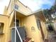 Rear exterior showing AC unit and access door at 820 N Oleander Ave, Daytona Beach, FL 32118