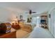 Primary bedroom with a double bed, ample closet space, and a view to the balcony at 2850 Ocean Shore Blvd # 15C, Ormond Beach, FL 32176