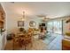 Living room features a dining area and sofa at 2850 Ocean Shore Blvd # 15C, Ormond Beach, FL 32176