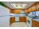 Bright kitchen with wood cabinets and appliances at 2850 Ocean Shore Blvd # 15C, Ormond Beach, FL 32176