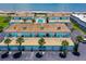 Overhead view of beachfront condos with pool and parking at 2850 Ocean Shore Blvd # 15C, Ormond Beach, FL 32176