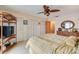 Primary bedroom with a double bed, dresser, and plenty of closet space at 2850 Ocean Shore Blvd # 15C, Ormond Beach, FL 32176