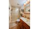 Clean bathroom with a shower/tub combo, vanity, and tiled floors at 2850 Ocean Shore Blvd # 15C, Ormond Beach, FL 32176