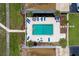 Complex pool and surrounding patio from above at 2850 Ocean Shore Blvd # 15C, Ormond Beach, FL 32176